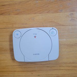 Working PS1 with two controllers, nine games, memory cards, and NASCAR controls